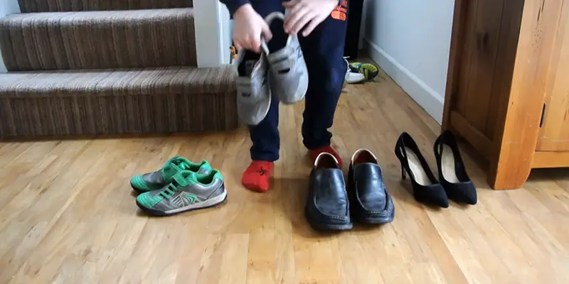 Putting shoes on