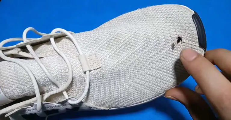 How to Prevent Toe Holes in Shoes FI